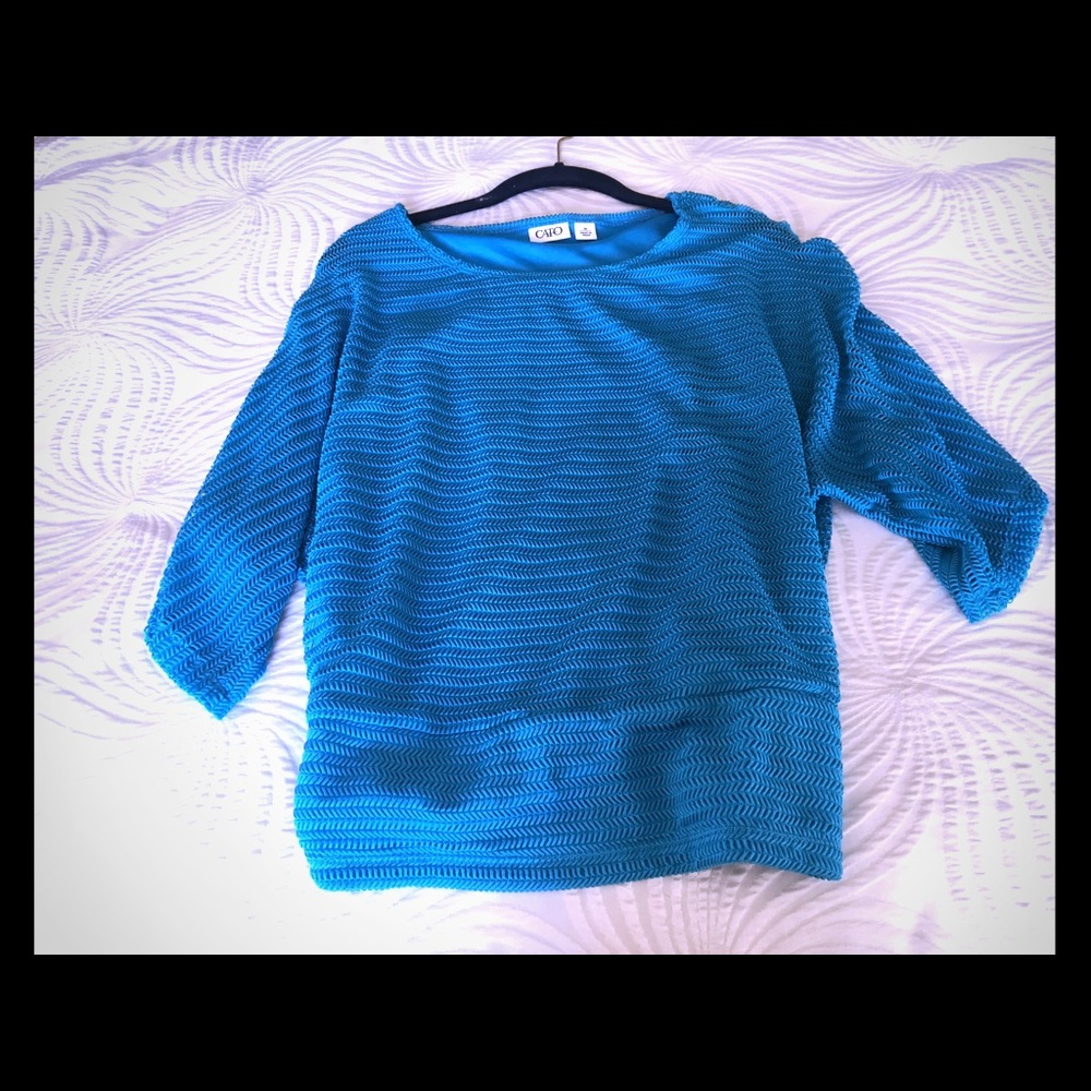 Blouse with cuffed bottom